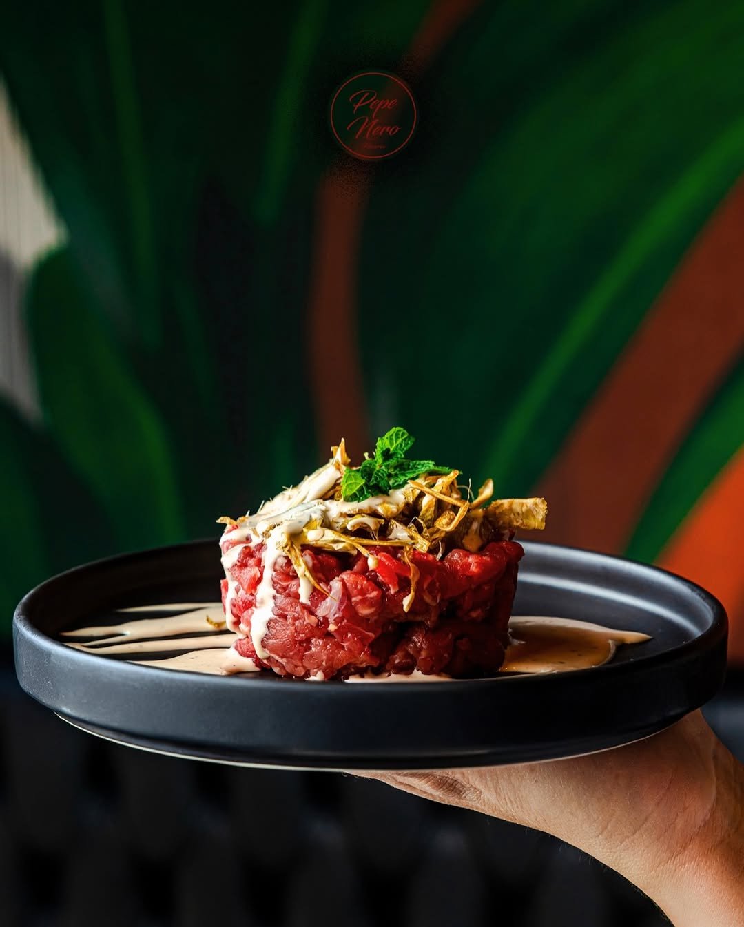 Tartare Che Manza Pepe Nero Altamura — antipasto con cardoncelli e cacio e pepe